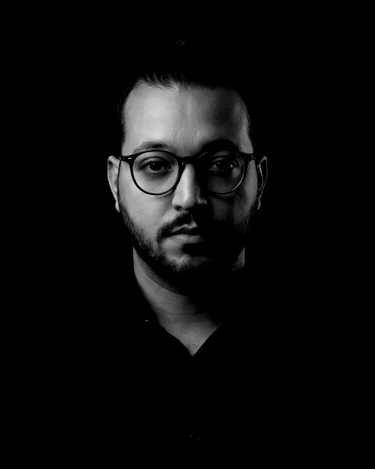 Jasser Haramia, black-and-white portrait.